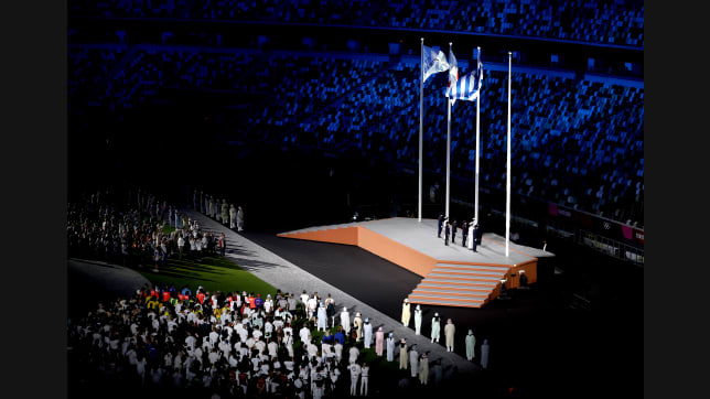 TOKYO, JAPAN - AUGUST 08: The national flag of Greece is raised during the Closing Ceremony of the Tokyo 2020 Olympic Games at Olympic Stadium on August 08, 2021 in Tokyo, Japan. (Photo by Francois Nel/Getty Images)