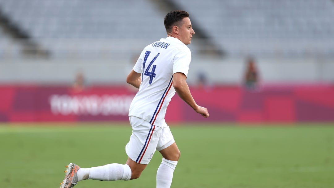 CHOFU, JAPÓN - 22 DE JULIO: Florian Thauvin # 14 del equipo de Francia corre con el balón durante el primer partido de grupo A de hombres entre México y Francia durante los Juegos Olímpicos de Tokio 2020 en el Estadio de Tokio el 22 de julio de 2021 en Chofu, Tokio, Japón .  (Foto de Dan Mullan / Getty Images)