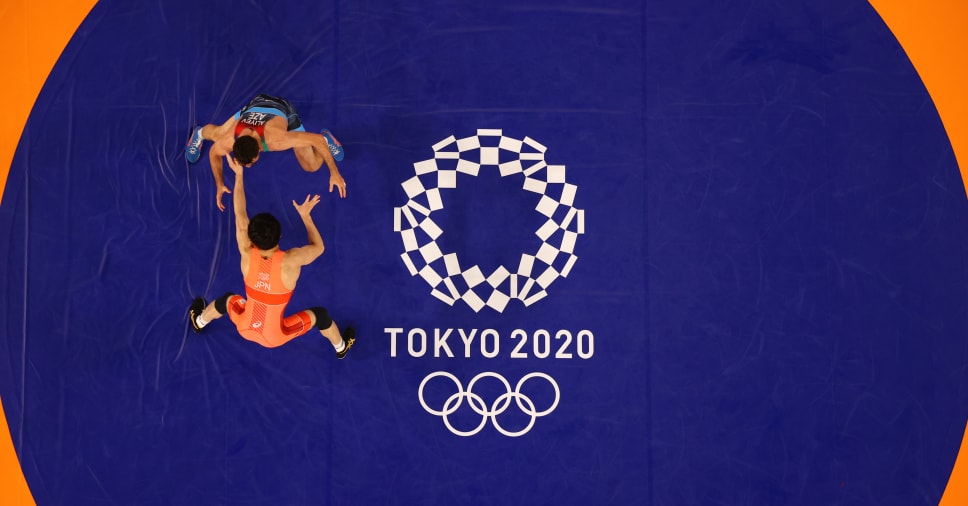 TOKYO, JAPAN - AUGUST 07: Takuto Otoguro of Team Japan competes against Haji Aliyev of Team Azerbaijan during the Men's Freestyle 65kg Final on day fifteen of the Tokyo 2020 Olympic Games at Makuhari Messe Hall on August 07, 2021 in Tokyo, Japan. (Photo by Naomi Baker/Getty Images)