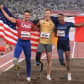 TOKYO, JAPAN - SEPTEMBER 01: (L-R) Bronze medalist Trenten Merrill of Team United States, gold medalist Markus Rehm of Team Germany and silver medalist Dimitri Pavade of Team France pose after competing in the Men's Long Jump - T64 Final on day 8 of the Tokyo 2020 Paralympic Games at Olympic Stadium on September 01, 2021 in Tokyo, Japan. (Photo by Carmen Mandato/Getty Images)