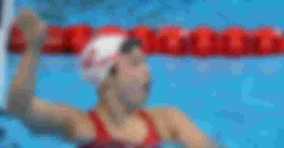 Margaret MacNeil floats to surprise women's 100m butterfly ...