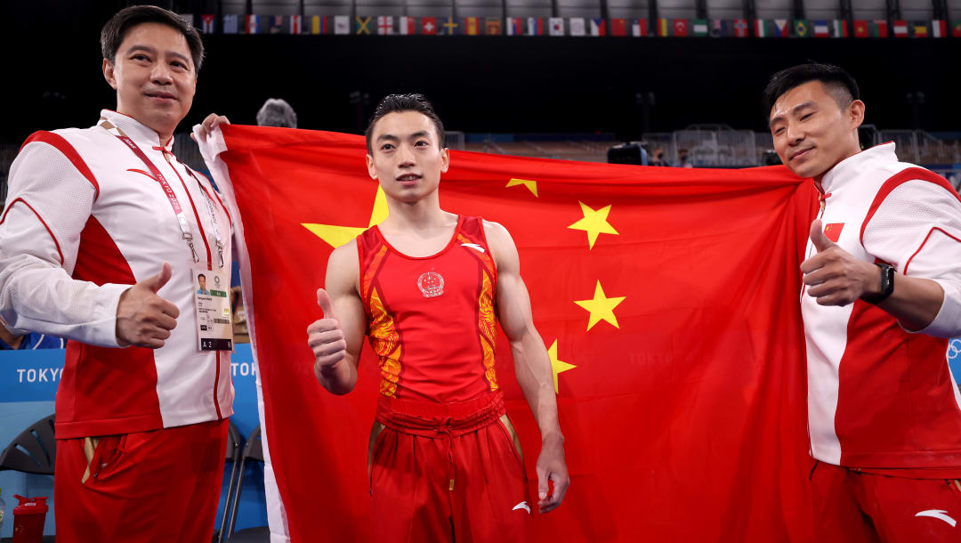 China's ZOU Jingyuan is golden in parallel bars final